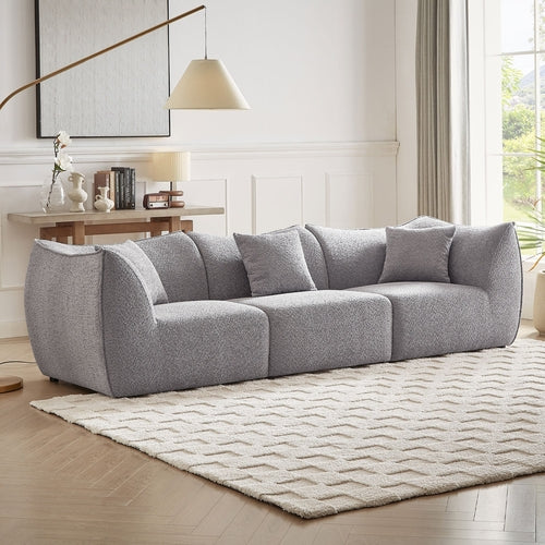 Canapé 3 places gris en tissu teddy à assise profonde