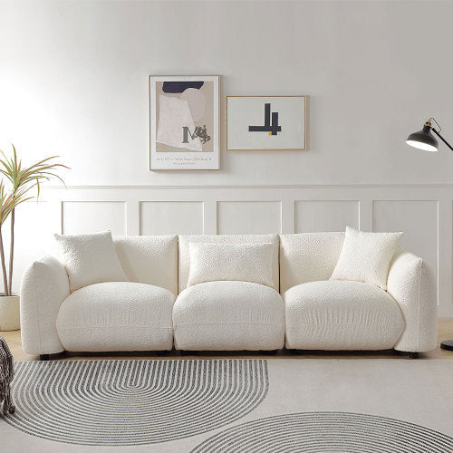 Canapé 3 places beige en bouclé, style moderne