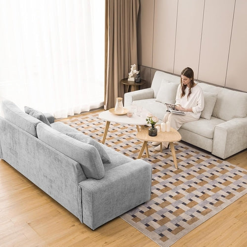 Canapé inclinable beige en chenille pour le salon