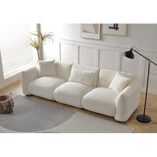 Canapé 3 places beige en bouclé, style moderne