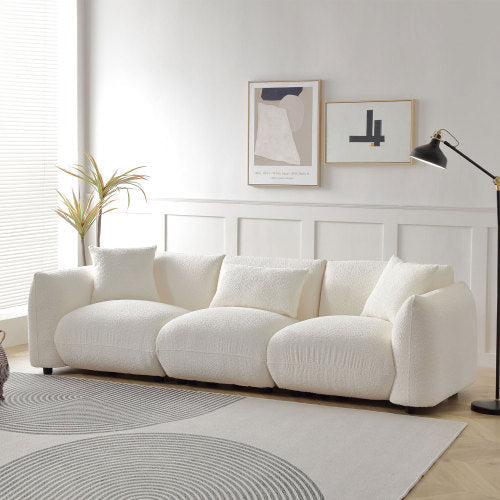 Canapé 3 places beige en bouclé, style moderne