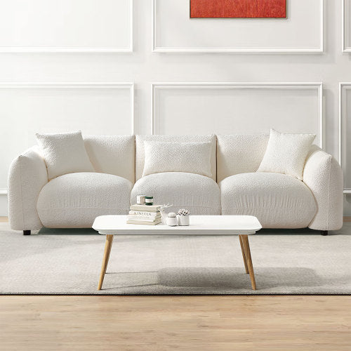 Canapé 3 places beige en bouclé, style moderne