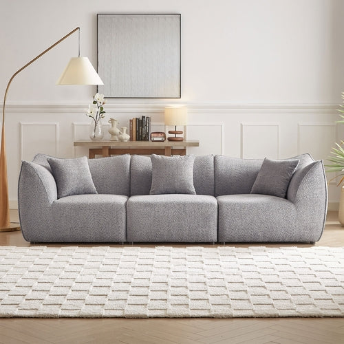 Canapé 3 places gris en tissu teddy à assise profonde